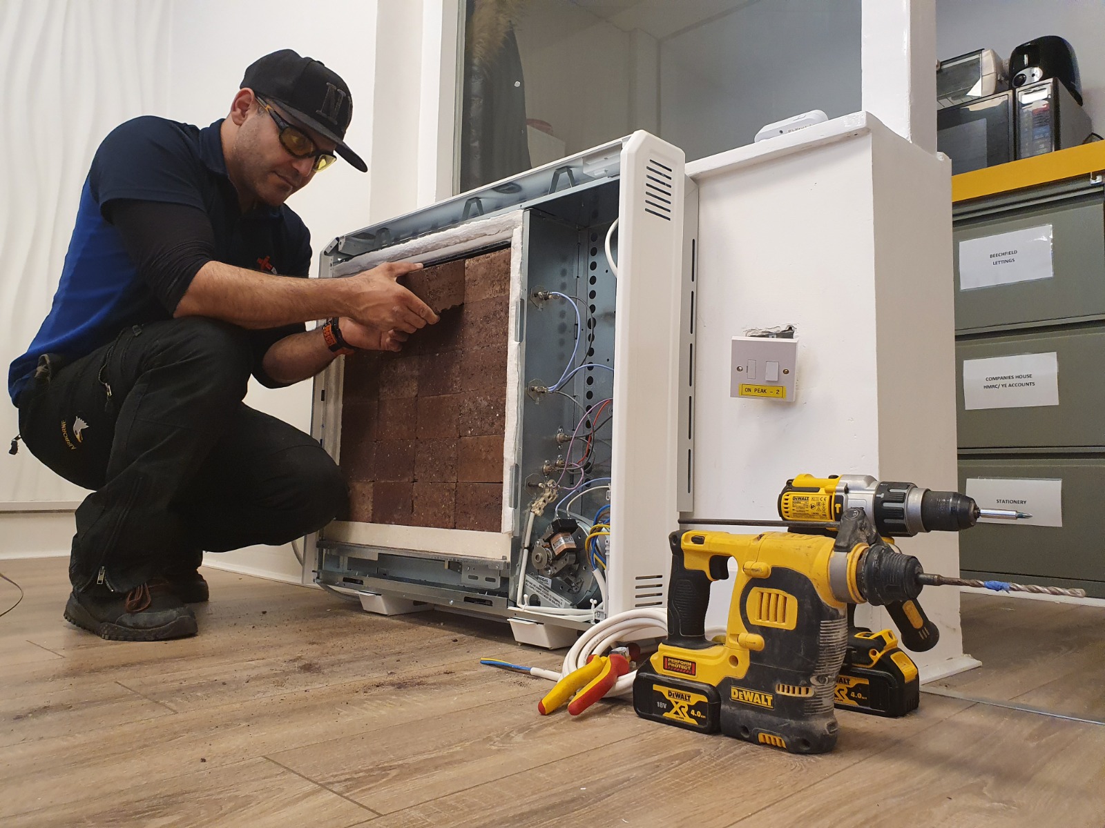 electrician repairing electrical box