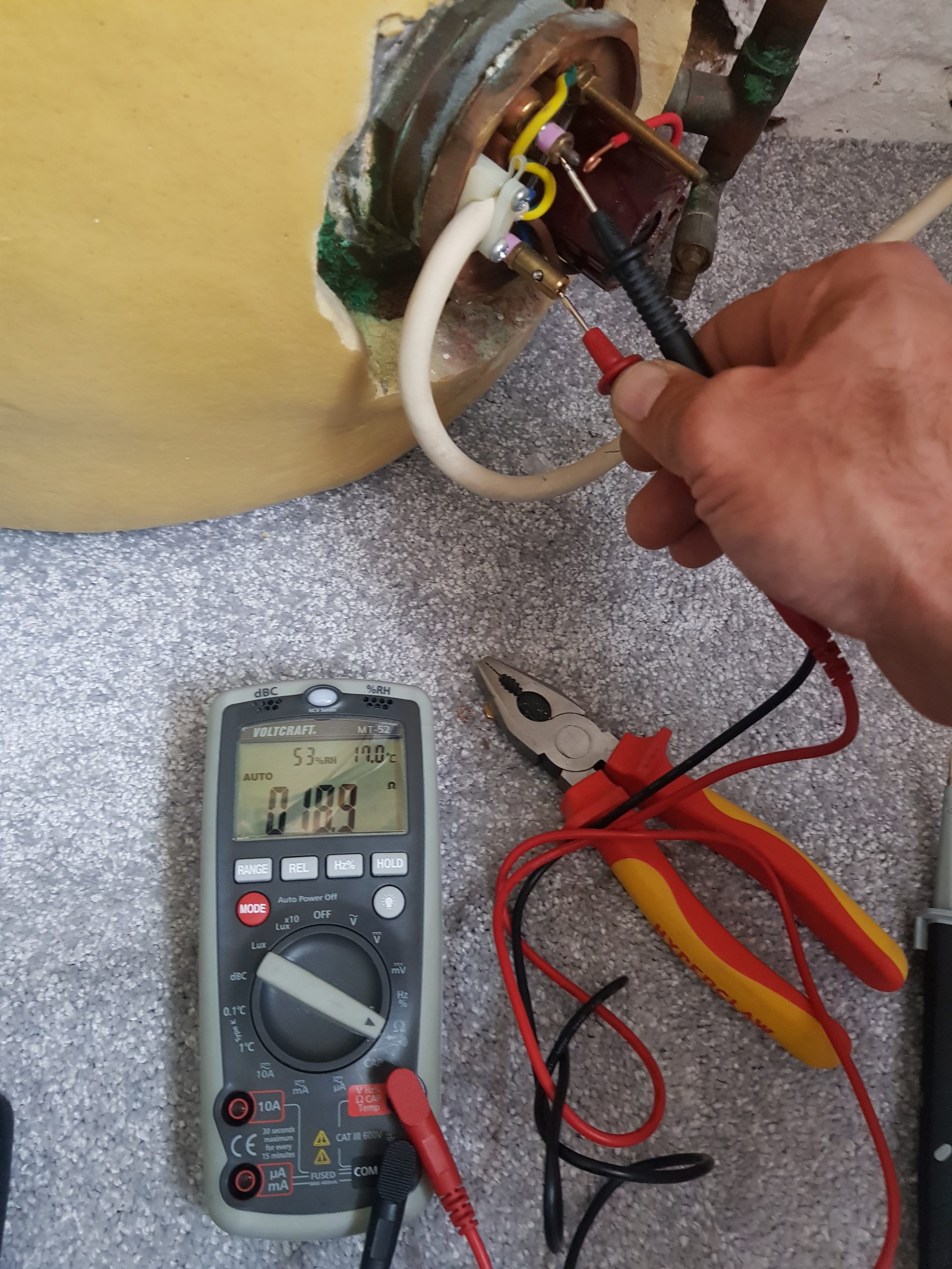 electrician repairing Immersion Heater